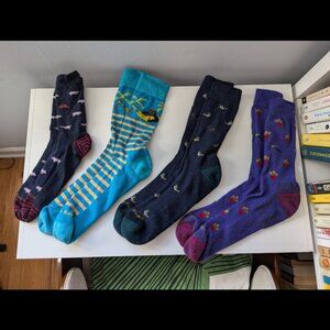 4 pairs men's XL Darn Tough light wool socks: hogs, eggplants, ducks, banana ape
